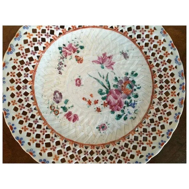 Antique 18th c. Chinese export porcelain plate with pierced rim and a relief basket weave bowl. Decorated with flowers and...