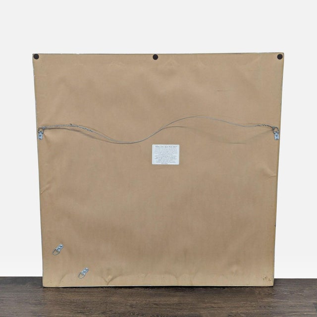 Wall mirror. Dimensions (in): 36W x 2D x 36H.