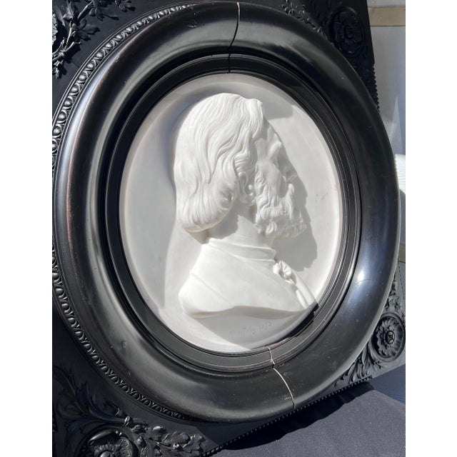 I am selling a white marble bas-relief, dated 1873 and signed by Jouffroy, a renowned 19th-century French sculptor. It...