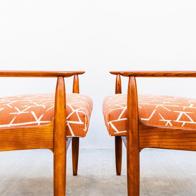 A unique pair of artisan-made easy chairs in oak and beach, produced in Arcadia, CA in the 1960s by a lifelong admirer of...