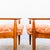 A unique pair of artisan-made easy chairs in oak and beach, produced in Arcadia, CA in the 1960s by a lifelong admirer of...