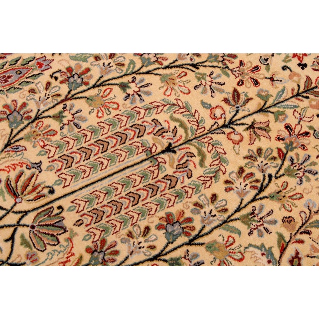Designed with mesmerizing intricacy and gorgeous color palette, this hand-knotted masterpiece demonstrates the beauty and...
