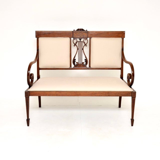 A stunning antique Edwardian settee. This was made in England, it dates from around the 1900-1910 period. The quality is...