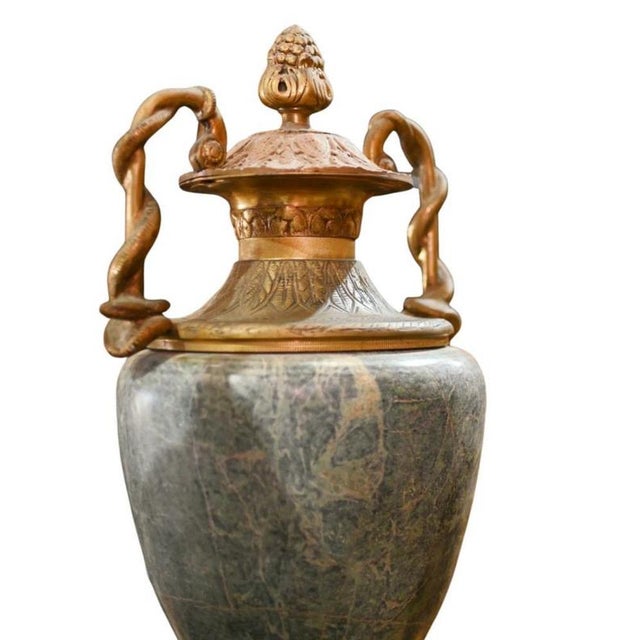 Gorgeous pair of french marble neo classical urns on pedestal stands material: the pedestals are crafted from a richly...