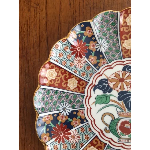 Purchased from Gump's San Francisco in 1987, this reproduction Imari platter from Arita Japan can be used for presentation...