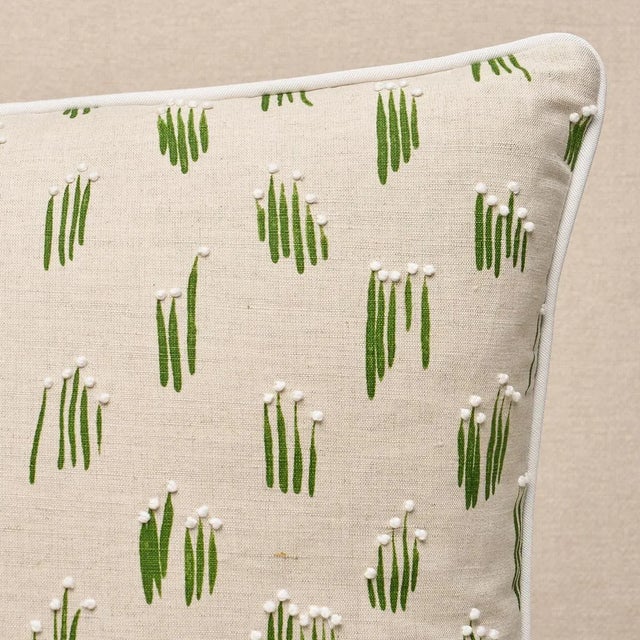 This pillow features Meadow Button Hand Embroidery by Studio Bon for Schumacher. Created in collaboration with Studio Bon...