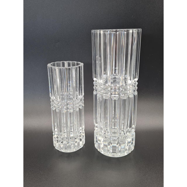An elegant set of two vases from the Montparnasse collection by the renowned French manufacturer Cristal d’Arques...