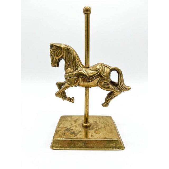Enhance your shelf or mantel display with this charming set of vintage solid brass horse figurines. This coordinated pair...