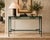 Elegant vintage iron and glass console table attributed to Mario Papperzini for Janus et Cie, distinguished by its...