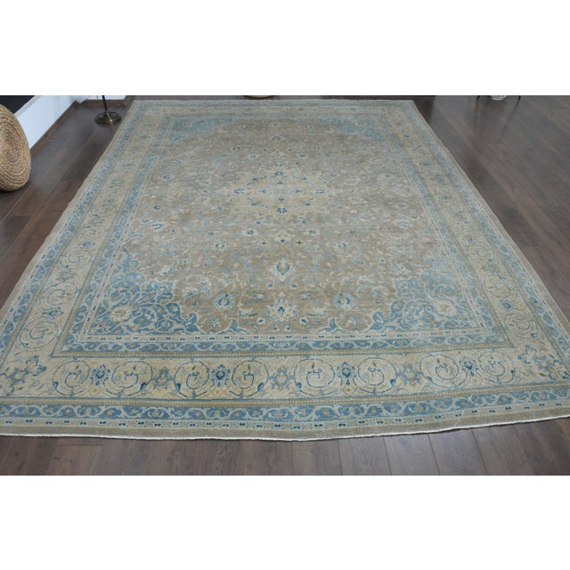 Vintage Persian Hand-Knotted area rug is a semi-antique vintage area rug. The '70s Eastern region of Anatolian's unique...