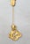 1980s goldtone "knotted" top and bottom jabot brooch Marked "© GIVENCHY PARIS NEW YORK" on a cartouche on the bottom part...