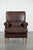 Characterful sheepskin armchair with a beautiful deep color. : This comfortable armchair is crafted from sheepskin and has...