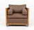 Therien Studio Workshops Walnut Club Chair, with brown leather cushions on four stepped feet, marked "Therien Studio...