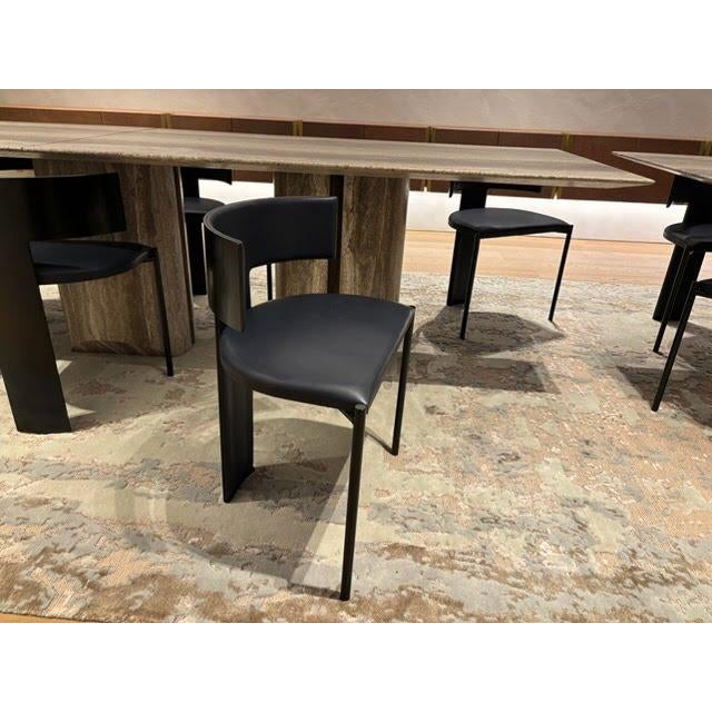 Overview: The essential design of our Zefir chair for Baxter results in a light sculpture out of metal and leather. Zefir...