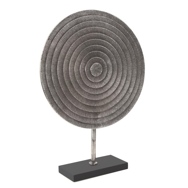 Cast in aluminum and finished in a rustic silver, the Kilo disc derives it's texture from industrial wheels that were use...