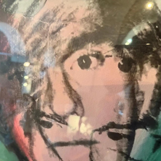 This striking 21st-century Pop Art lithograph presents one of Andy Warhol’s most compelling and introspective subjects:...