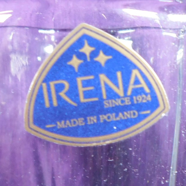 This is an Irena Cut Crystal Vase from Poland. The vase is a round shape with flat cut sides and a blue and silver Irena...