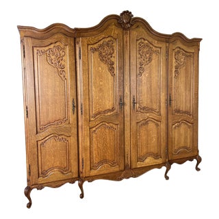 Vintage French Louis XVI Style Carved Oak 4-Door Wardrobe For Sale