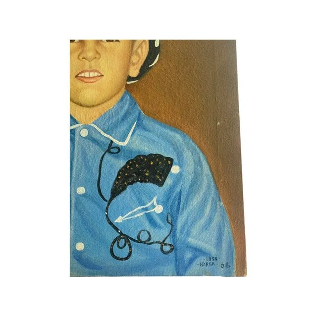 Mid 20th Century Oil on Canvas of Cowboy Signed Korea 1958. With a beautiful saturated brown background, featuring a young...