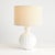 This brightWhite ceramic lamp is a modern take on a classic silhouette. The wellscaled shade and matte finish complete the...