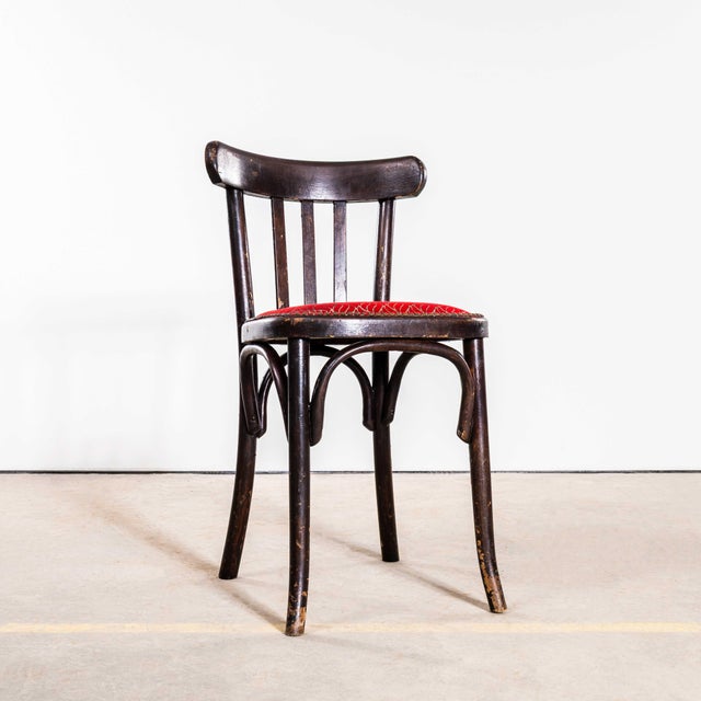 1950’s Ebonised Upholstered Classic Luterma Cafe Dining Chairs. The process of steam bending beech to create elegant...