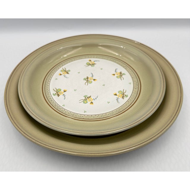 Elevate your dining experience with this exquisite 8-piece dinner and salad plate set from DENBY England's Verona...