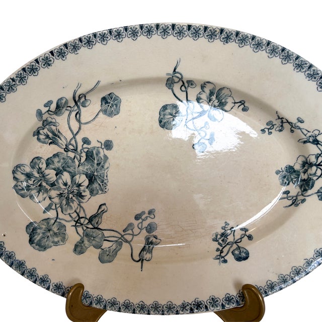 A charming and delicate oval plate from the renowned French faience manufacturer Gien, dating from the late 19th century....
