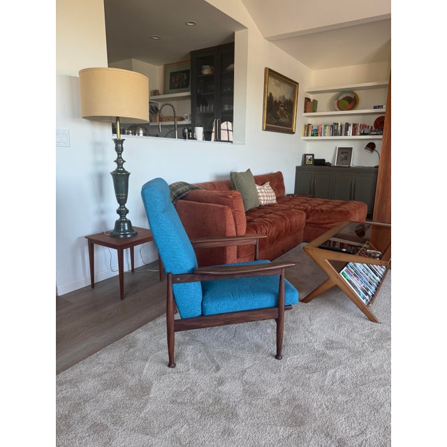 Authentic 1960s British mid-century reclining lounge chair from the Guy Rogers "Manhattan" range. Afrormosia teak frame,...