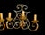 This piece is firmly rooted in the early 20th-century French wrought iron aesthetic, but more "neo-rustic/revival" than...