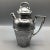 Late 30’s electric plated nickel silver tea pot style cocktail shaker with original cork stopper on the top and in the...
