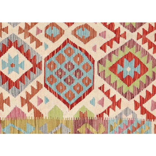 Contemporary Afghan Maimana Kilim Rug. Hand woven with wool on wool foundation by the Maimana tribes of Northern...