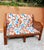 Two-seater rattan sofa/bench in a honey color, vintage design circa 1970. Armrests with a cross-braced design. The seat...
