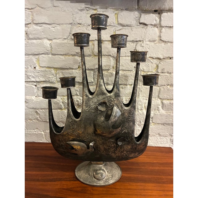 Large Brutalist Brazed Metal Candelabra signed by Gene Byron, Mexico, 1960s. Measures 16 X 23 1/2″h. and has a dark, warm...