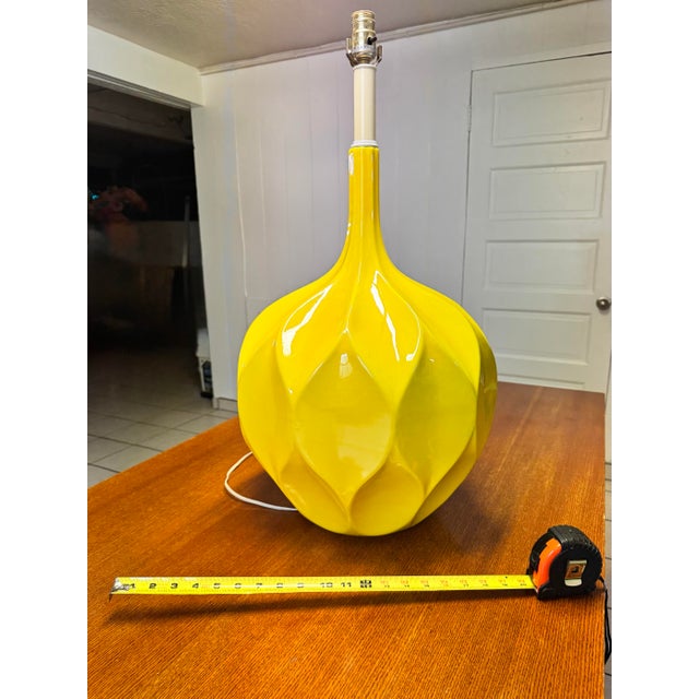 This extra large, eye-catching table lamp captures the essence of Mid-Century Modern style. The beautiful, bright yellow...
