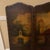 Antique trifold triptych hand painted leather screen depicting a village church or abbey. Can be hung on a wall or used as...
