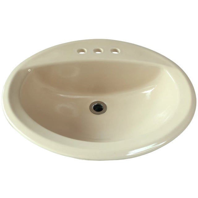 This sink is in very good condition on the whole, with few blemishes to be found. There are four tiny, pinpoint chips on...