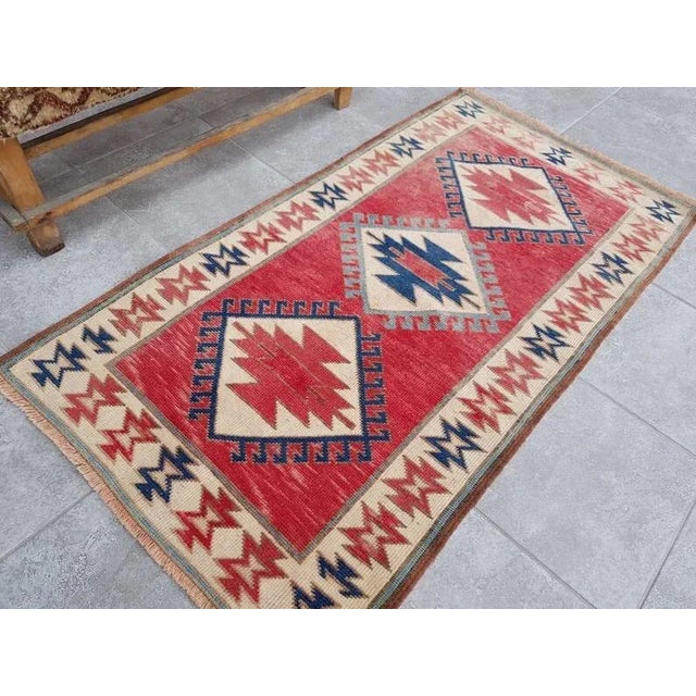 A Turkish handmade vintage Anatolian Oushak rug. We collect old vintage antique rugs from Anatolia, which is the eastern...
