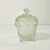A lovely antique piece of Americana. This pressed glass lidded Candy Dish features botanical leaves, grape clusters and...