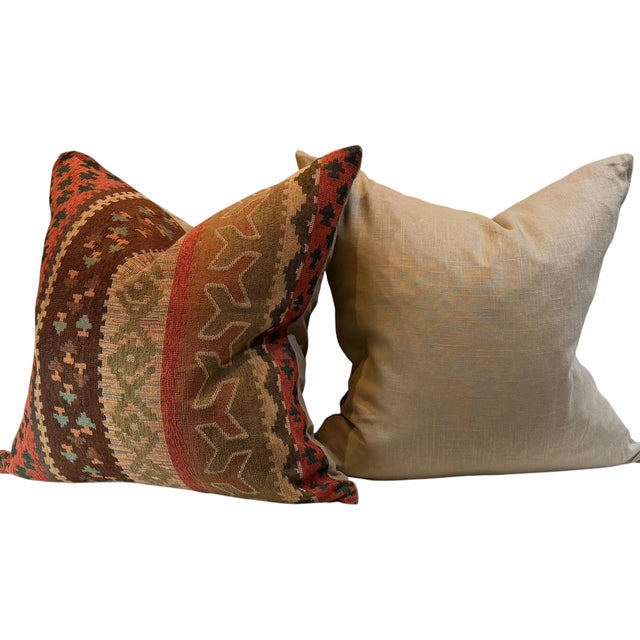 A handsome pair of vintage Ralph Lauren style pillows dating to the late 1970s to early 1980s, embodying the rich, layered...