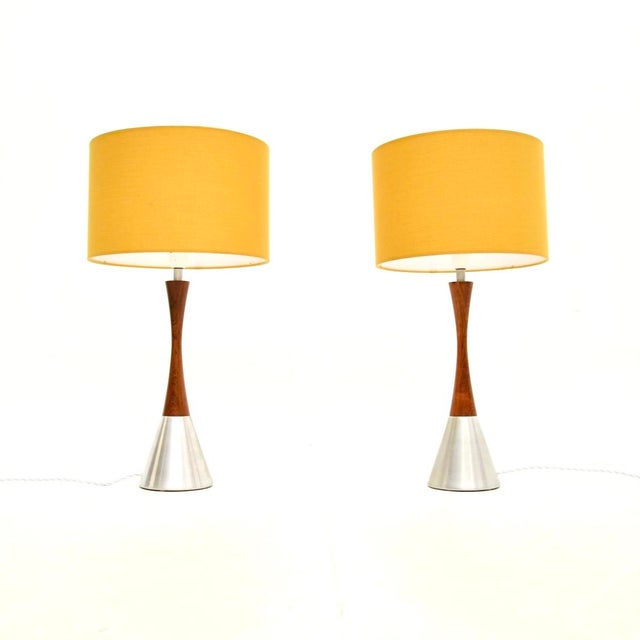 A stylish and very well made pair of Swedish vintage wood and steel table lamps by Bergboms, dating from the 1960-70’s....