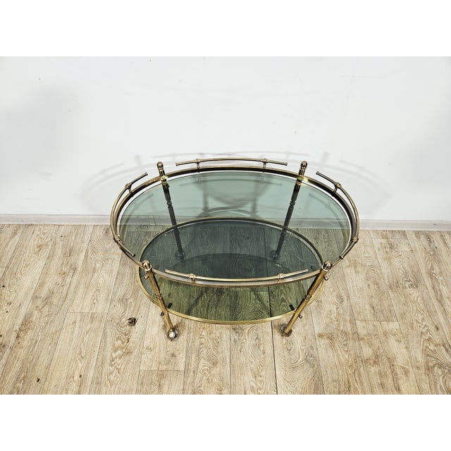 We present an exceptionally elegant, mobile living room bar cart from France, dating back to the 1960s. This piece...