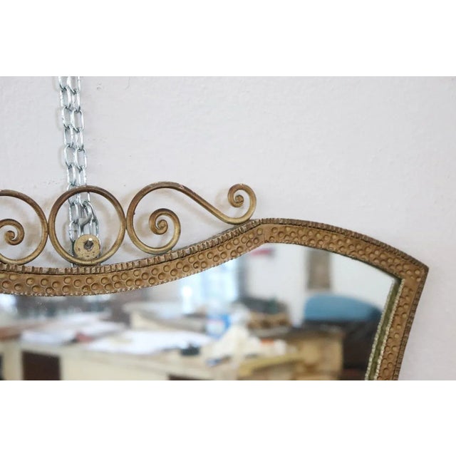 Lovely 20th Century Italian vintage golden iron wall mirror 1950s with refined decoration. Perfect condition.