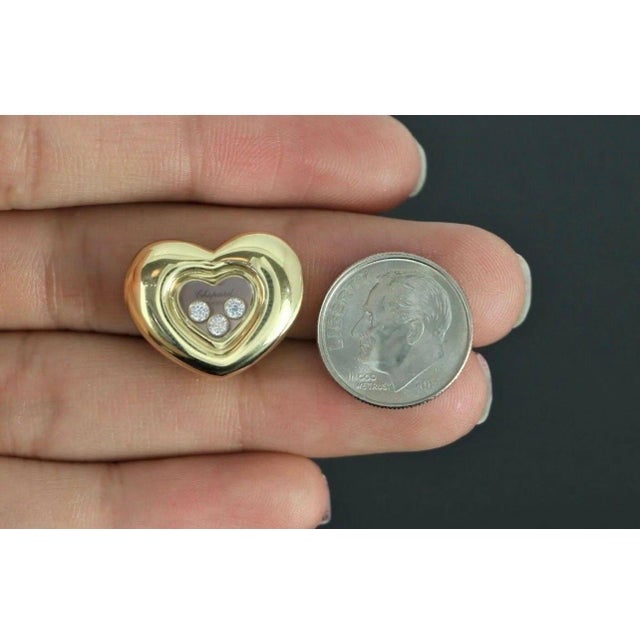 Chopard Happy Floating Diamonds Heart Clip On 18 karat Yellow Gold Earrings Inspired by sparkling drops of water in a...