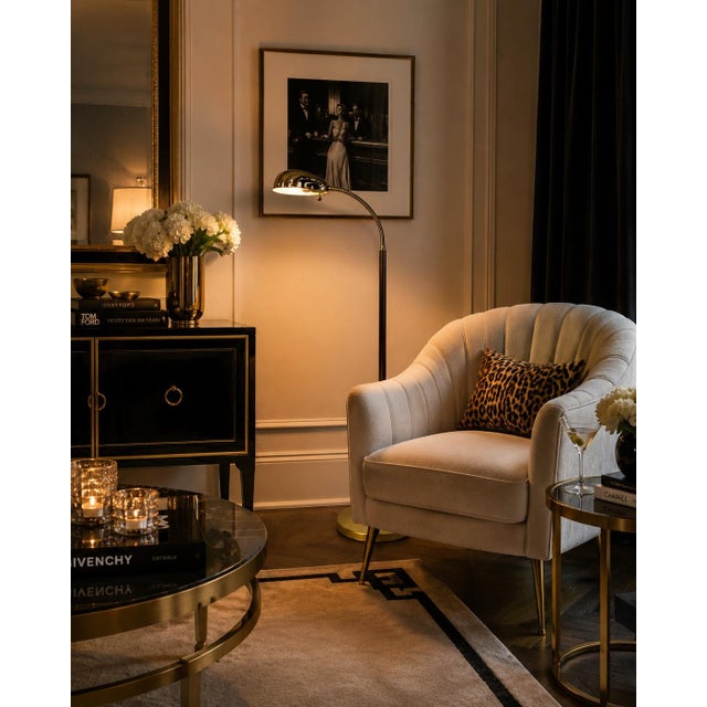 Bring timeless sophistication to your interior with this elegant Hollywood Regency brass floor lamp. Featuring a...