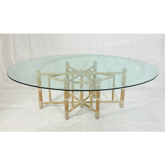 A refined and highly desirable vintage dining table by McGuire Furniture, designed and manufactured in San Francisco,...