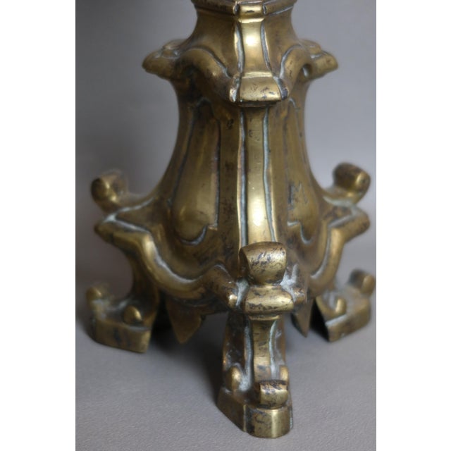 Pair of bronze candlesticks, 17th century. Very good condition. Dimensions: 60cm high.