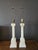 Elegant pair of carved alabaster column lamps in the Neoclassical Revival style. Features fluted pillars and Ionic-style...