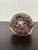 This vintage red bubble spherical paper weight is 3” high with 3" by 3" wide and deep. It is quite stunning and to be...