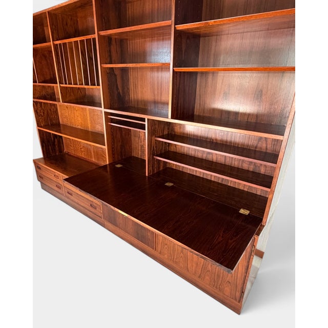 Exceptional set of two modular bookcases manufactured by the renowned Danish furniture maker Hundevad & Co. in the 1960s....