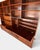 Exceptional set of two modular bookcases manufactured by the renowned Danish furniture maker Hundevad & Co. in the 1960s....